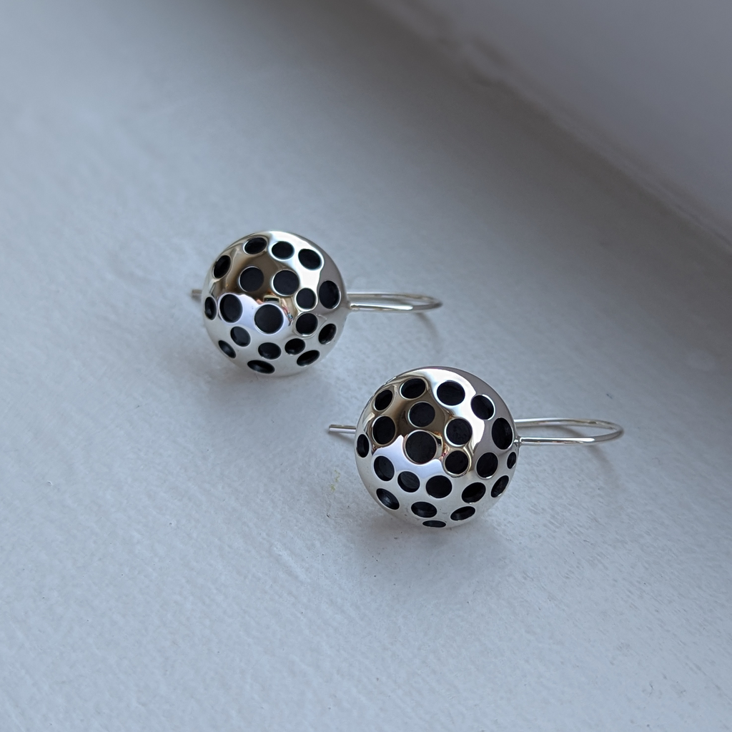 round domed holey earrings