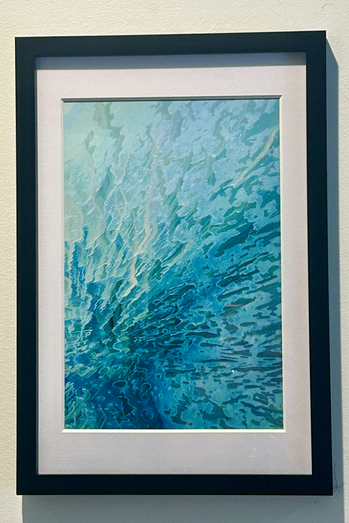 'Secrets of the Sea' displayed in its frame