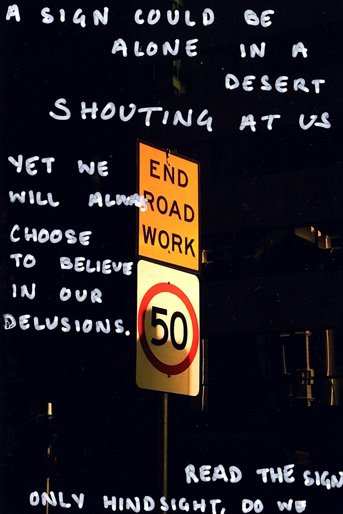 A sign could be alone in a desert, shouting at us. Yet we will always choose to believe in our delusions. Only hindsight, do we read the sign.